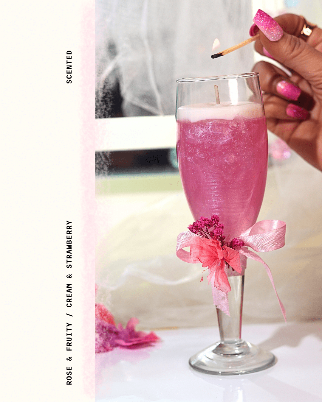 Pink candle in a champagne glass with floral decorations. Perfect for Wedding/ Bachalorette return favour.